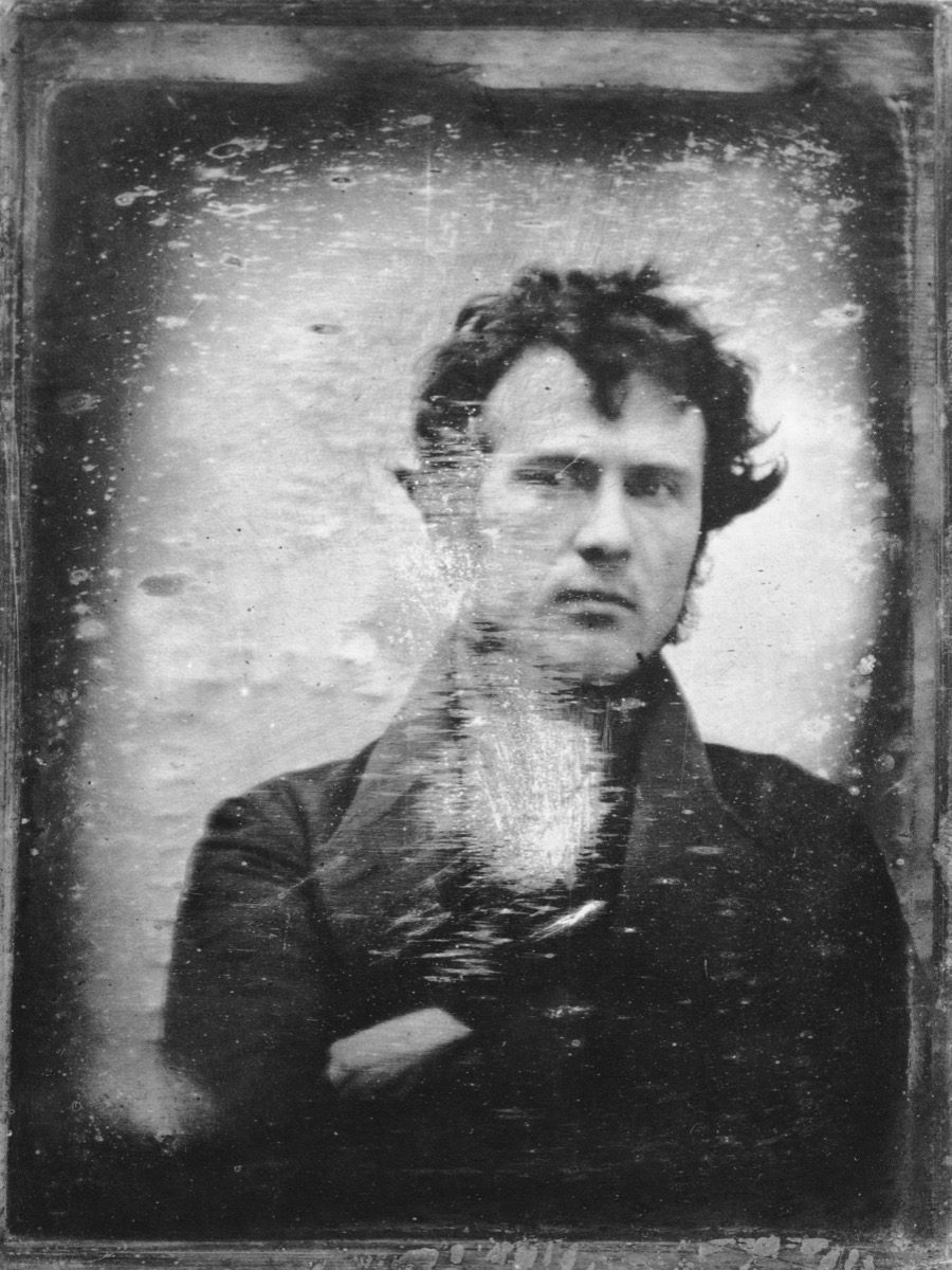 Robert Cornelius's October or November 1839 daguerreotype self-portrait, made in the yard behind his family's Philadelphia store.