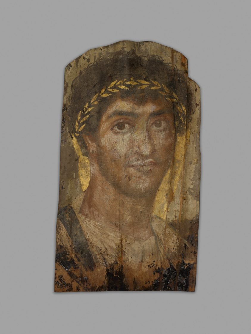 A Romano-Egyptian mummy portrait of a man wearing a laurel wreath, painted in encaustic on wood, early to mid-2nd century AD, from the Art Institute of Chicago.