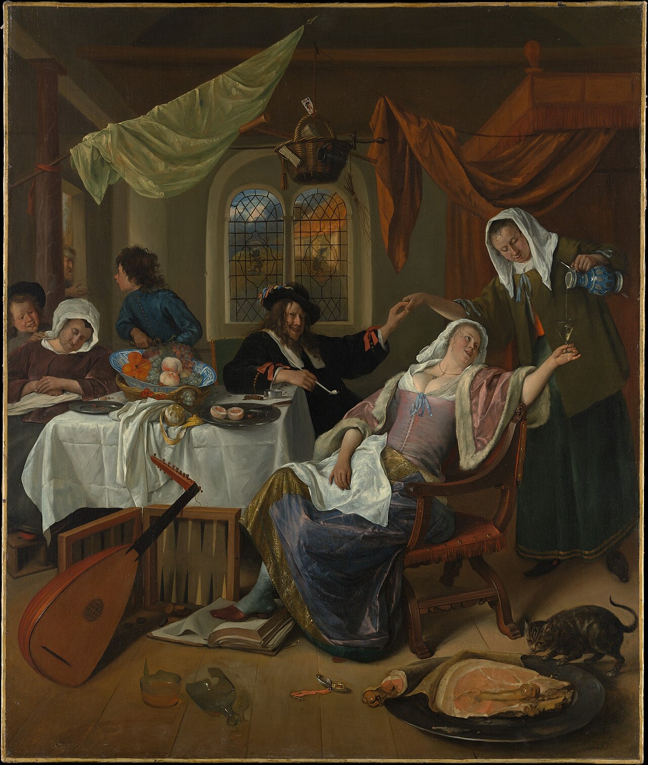 Jan Steen's The Dissolute Household: a woman sprawled in a chair holding a wine glass, a man with a pipe beside her, a maid pouring wine, a boy and a sleeping woman at a table, a lute on the floor and a cat nosing a joint of meat on a platter.