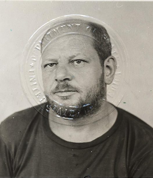 Jackson Pollock's passport photograph, taken July 21, 1955, roughly three years after he painted Convergence and about a year before his death.
