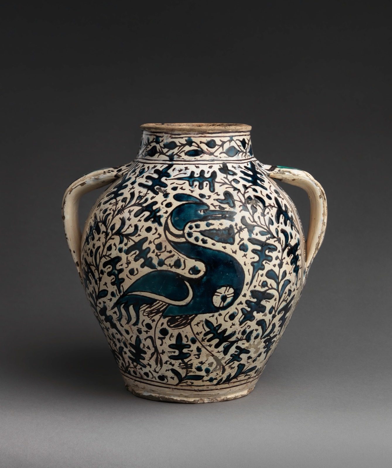 A Florentine maiolica apothecary jar, probably 1431, attributed to the workshop of Giunta di Tugio, tin-glazed earthenware with bird decoration.