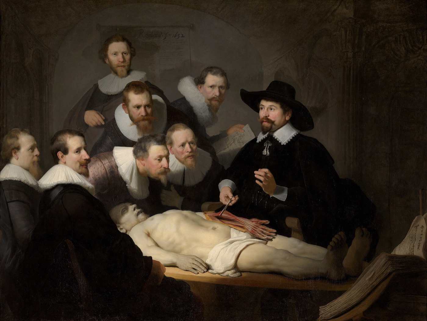 Rembrandt van Rijn's The Anatomy Lesson of Dr. Nicolaes Tulp, 1632, showing Dr. Tulp holding forceps over the dissected left forearm of the corpse while seven members of the Amsterdam Guild of Surgeons look on.